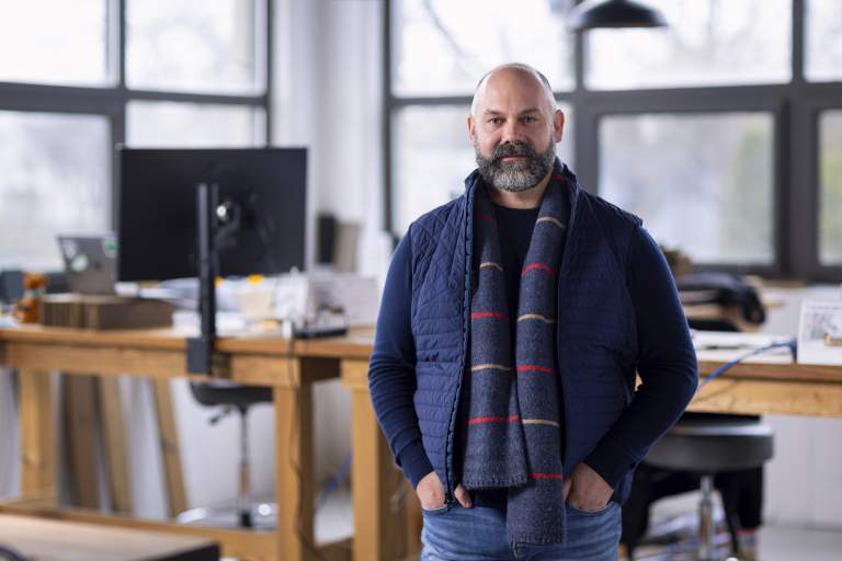 businessman wearing vest and scarf